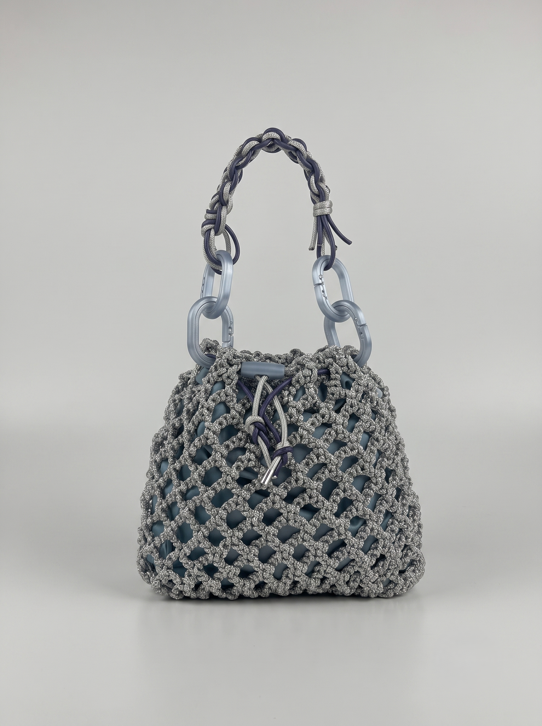 NODO POUCH — Pochette intrecciata con anelli in 3D